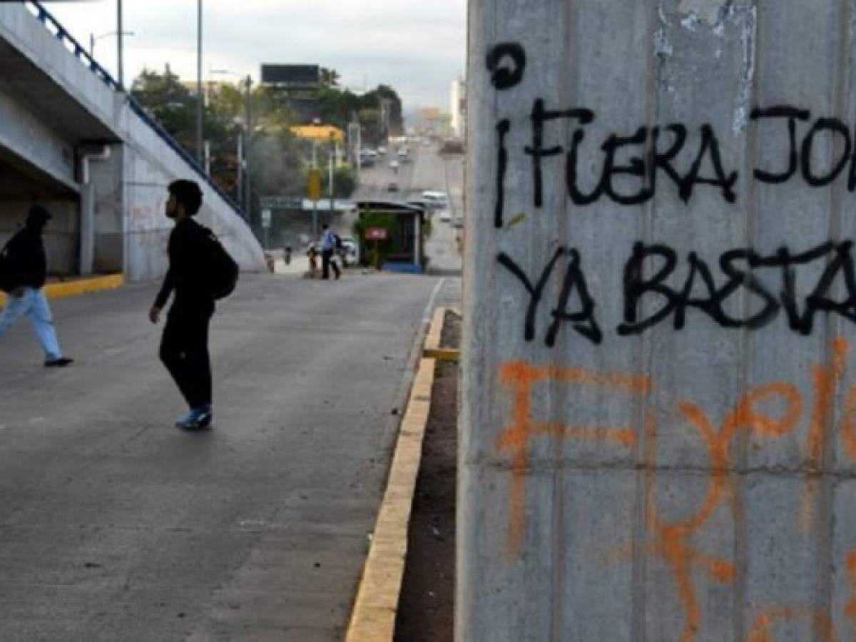 Toque de queda frena violencia en Honduras; oposición busca acelerar conteo de votos