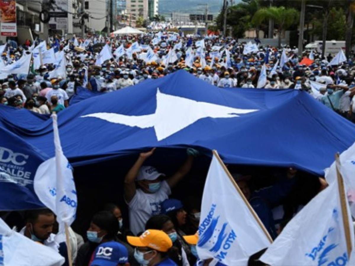 Oficialistas marchan en Honduras contra el 'comunismo' a tres semanas de elecciones
