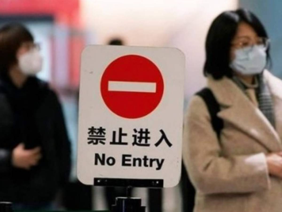 Guatemala y El Salvador prohíben ingreso de viajeros de China por coronavirus
