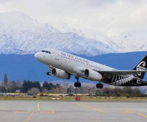 QUEEN TOWN NEWE ZEALAND-SEPTEMBER 6: air new zealand plane take of from queen town airport in south island new zealand on september6, 2015 in Queen Town New Zealand