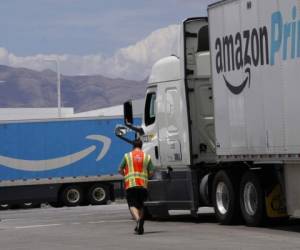 LAS VEGAS, NV - JUNE 06: A security guard check in an Amazon truck at the Amazon regional distribution center on June 6, 2019 in Las Vegas, Nevada. Amazon is expanding into more self delivery of their packages. George Frey/Getty Images/AFP