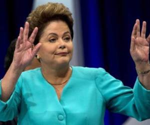 Es una elección extremadamente dividida: las clases alta y media alta están decididas por Neves y la media baja y los excluidos por Rousseff. (Foto: AFP)