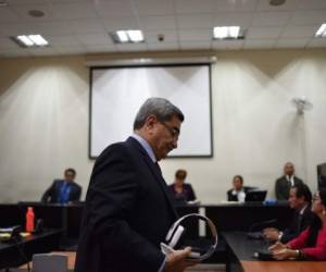 Retired Guatemalan General Jose Rodriguez (C), is pictured after speaking during his trial on charges of genocide committed during the regime of late Guatemalan dictator (1982-1983) Jose Efrain Rios Montt, in Guatemala City on September 26, 2018.Rios Montt, who passed away last April, was sentenced in 2013 to 80 years in prison for genocide and Rodriguez was absolved, but the constitutional court declared the process null and cancelled both rulings after irregularities were detected and a new trial was ordered / AFP PHOTO / Johan ORDONEZ / The erroneous mention[s] appearing in the metadata of this photo by Johan ORDONEZ has been modified in AFP systems in the following manner: [Rios Montt, who passed away last April, was sentenced in 2013 to 80 years in prison for genocide and Rodriguez was absolved, but the constitutional court declared the process null and cancelled both rulings after irregularities were detected and a new trial was ordered.] instead of [Rios Montt, who passed away last April, and Rodriguez were sentenced in 2013 to 80 years in prison for genocide, but the constitutional court declared the process null and cancelled the sentence after irregularities were detected and a new trial was ordered. On Wednesday the court will finally deliver a sentence.]. Please immediately remove the erroneous mention[s] from all your online services and delete it (them) from your servers. If you have been authorized by AFP to distribute it (them) to third parties, please ensure that the same actions are carried out by them. Failure to promptly comply with these instructions will entail liability on your part for any continued or post notification usage. Therefore we thank you very much for all your attention and prompt action. We are sorry for the inconvenience this notification may cause and remain at your disposal for any further information you may require.