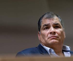 (FILES) In this file photo taken on October 09, 2019, Ecuador's former President (2007-2017) Rafael Correa gives a press conference at the European Parliament in Brussels. - Former Ecuador president Rafael Correa was sentenced in absentia to eight years in prison for corruption during his 10-year term in office, the attorney general's office said April 7, 2020. (Photo by Kenzo TRIBOUILLARD / AFP)