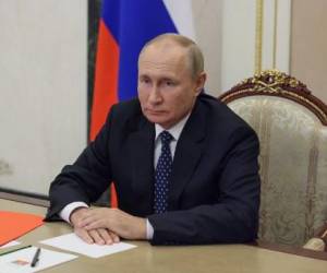 El presidente ruso, Vladimir Putin, preside una reunión del Consejo de Seguridad a través de un enlace de video en Moscú el 23 de septiembre de 2022. (Foto de Gavriil GRIGOROV / SPUTNIK / AFP)