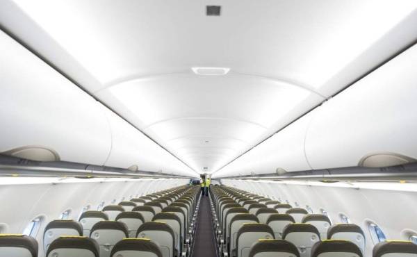 Picture shows the cabin of the new Airbus A 320 neo aircraft model presented by the Spanish low-cost airline Vueling at Barcelona's airport in El Prat de Llobregat on September 27, 2018. (Photo by Josep LAGO / AFP)