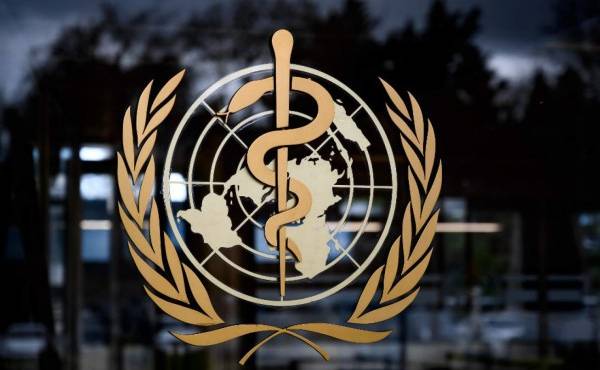 (FILES) In this file photo taken on March 09, 2020, the logo of the World Health Organization (WHO) at the its headquarters in Geneva. - The US is seeking to 'fundamentally change' WHO amid threats to withhold contributions in the midst of the coronavirus pandemic, Pompeo said April 14, 2020. US President Donald Trump has promised an announcement this week on US funding to the UN body on the forefront of the crisis. The US is the top donor to the WHO, offering $400 million in 2019. (Photo by Fabrice COFFRINI / AFP)
