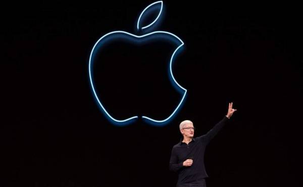 (FILES) In this file photo taken on June 03, 2019 Apple CEO Tim Cook presents the keynote address during Apple's Worldwide Developer Conference (WWDC) in San Jose, California. - Apple on July 30, 2019, delivered stronger-than-expected results in the just-ended quarter as growth from services helped offset weak iPhone sales, sparking a rally in shares of the tech giant. Profit in the third quarter to June fell 13 percent from the year-ago period to $10 billion while overall revenues increased one percent to a better-than-forecast $53.8 billion. (Photo by Brittany Hosea-Small / AFP)