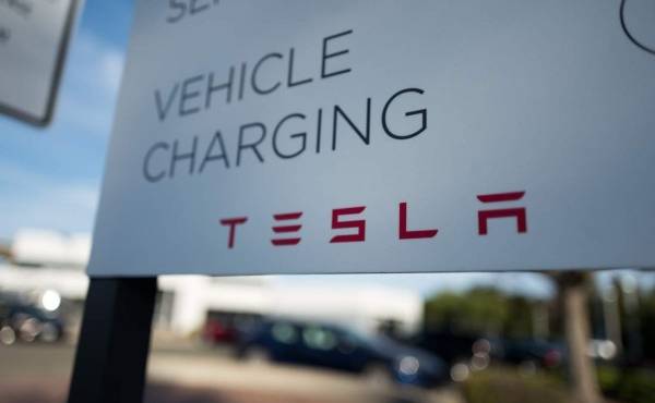 Dublin, California, United States - July 23, 2018: Close-up of sign with Tesla Motors logo in Pleasanton, California, July 23, 2018