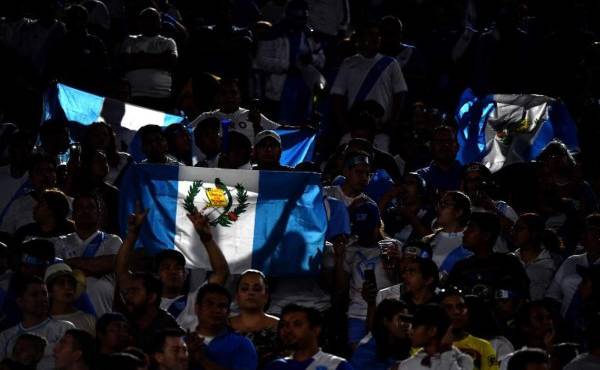 LOS ANGELES, CA - SEPTEMBER 07: Fans hold up flags before the match between Argentina and Guatemala during the first half at Los Angeles Memorial Coliseum on September 7, 2018 in Los Angeles, California. Harry How/Getty Images/AFP