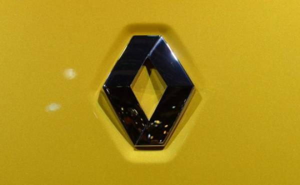 The Renault Megane sports car logo is pictured at the Auto Expo 2014 in Greater Noida on the outskirts of New Delhi on February 5, 2014. The 12th edition of the Auto Expo takes place from February 5-11. AFP PHOTO/ SAJJAD HUSSAIN (Photo by SAJJAD HUSSAIN / AFP)